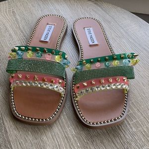 Green silver and tan sandals